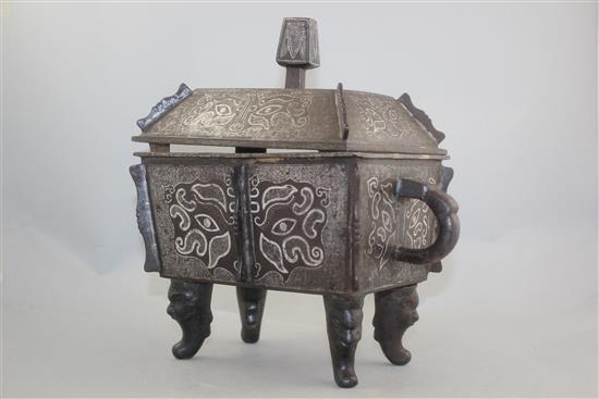 A Chinese iron and silver overlaid vessel and cover, Fangding, probably 19th century, 27.5cm